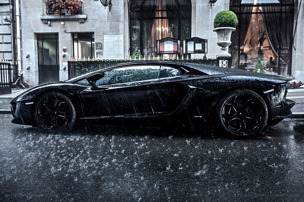 Black Lamborghini in the rain