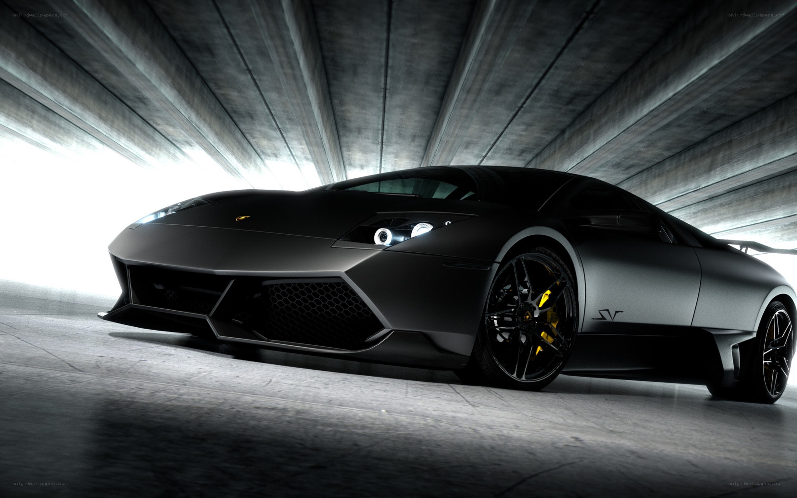 black lamborghini in tunnel