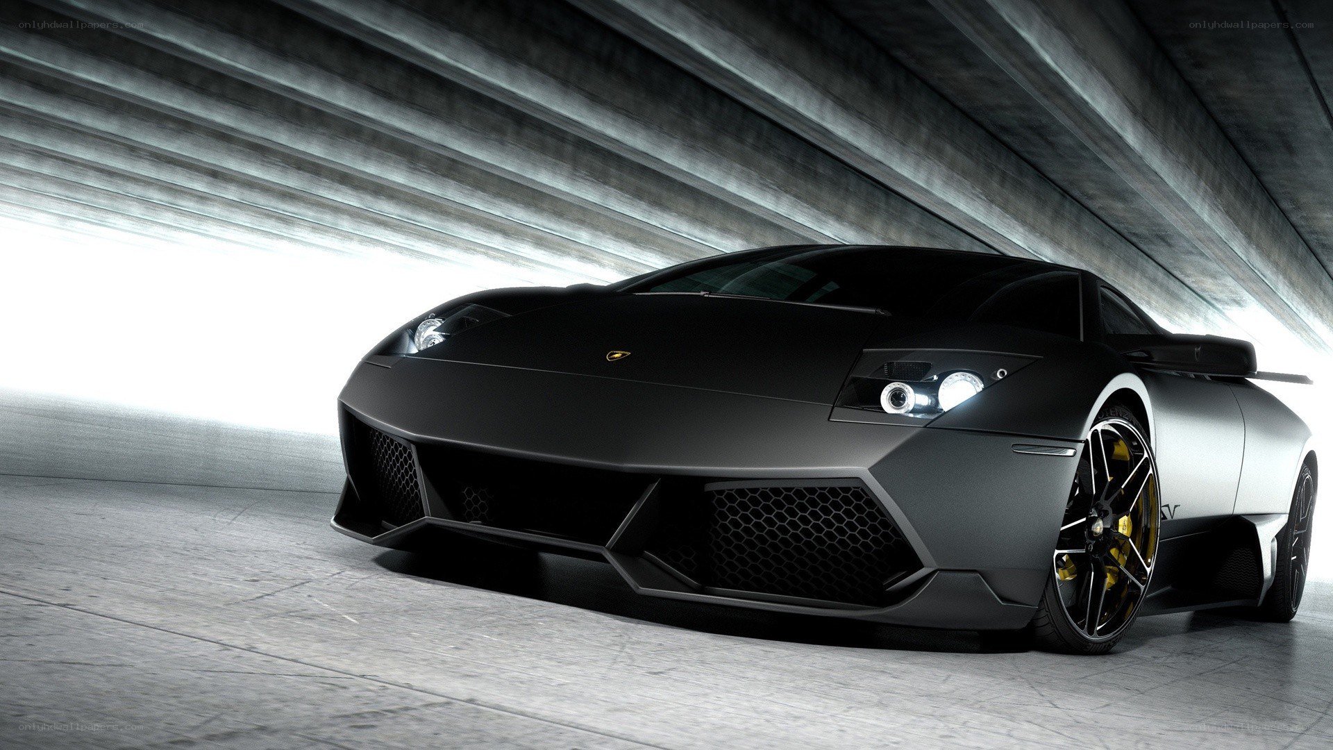 black lamborghini in tunnel