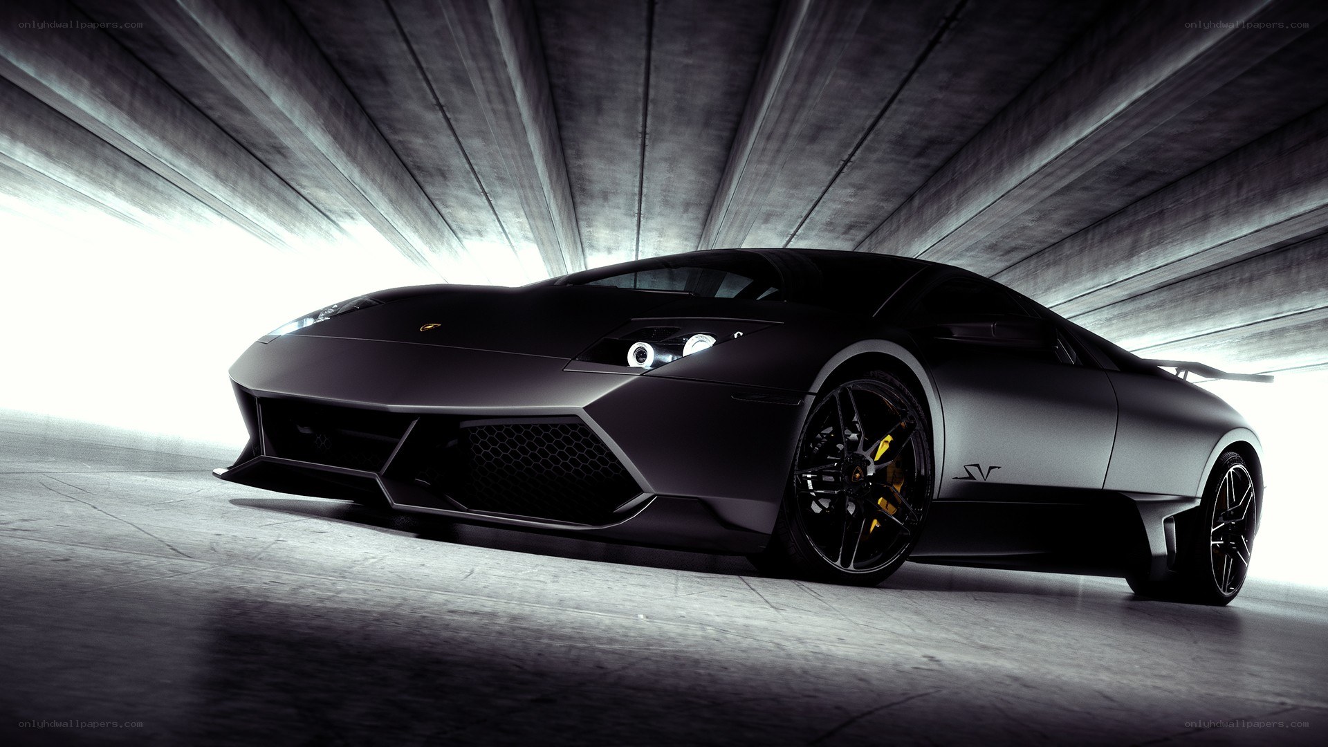 Black Lamborghini in tunnel