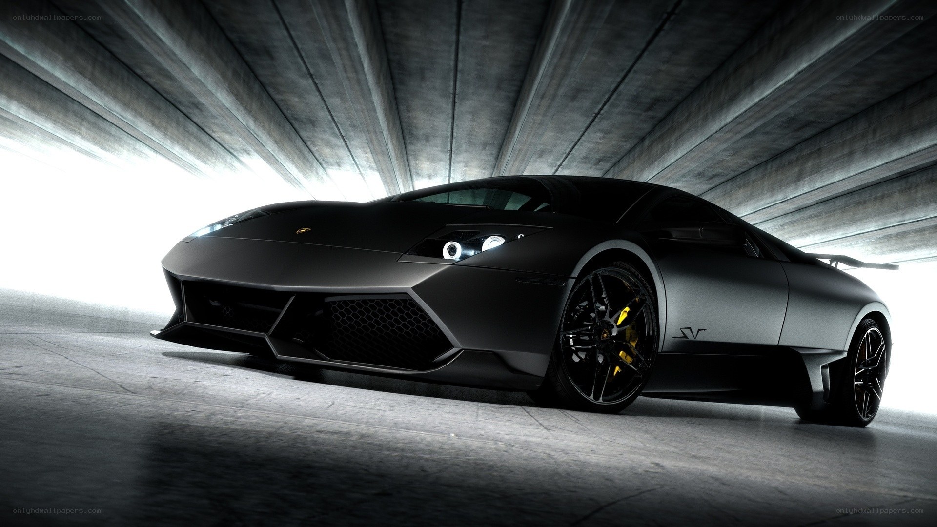 Black Lamborghini in tunnel