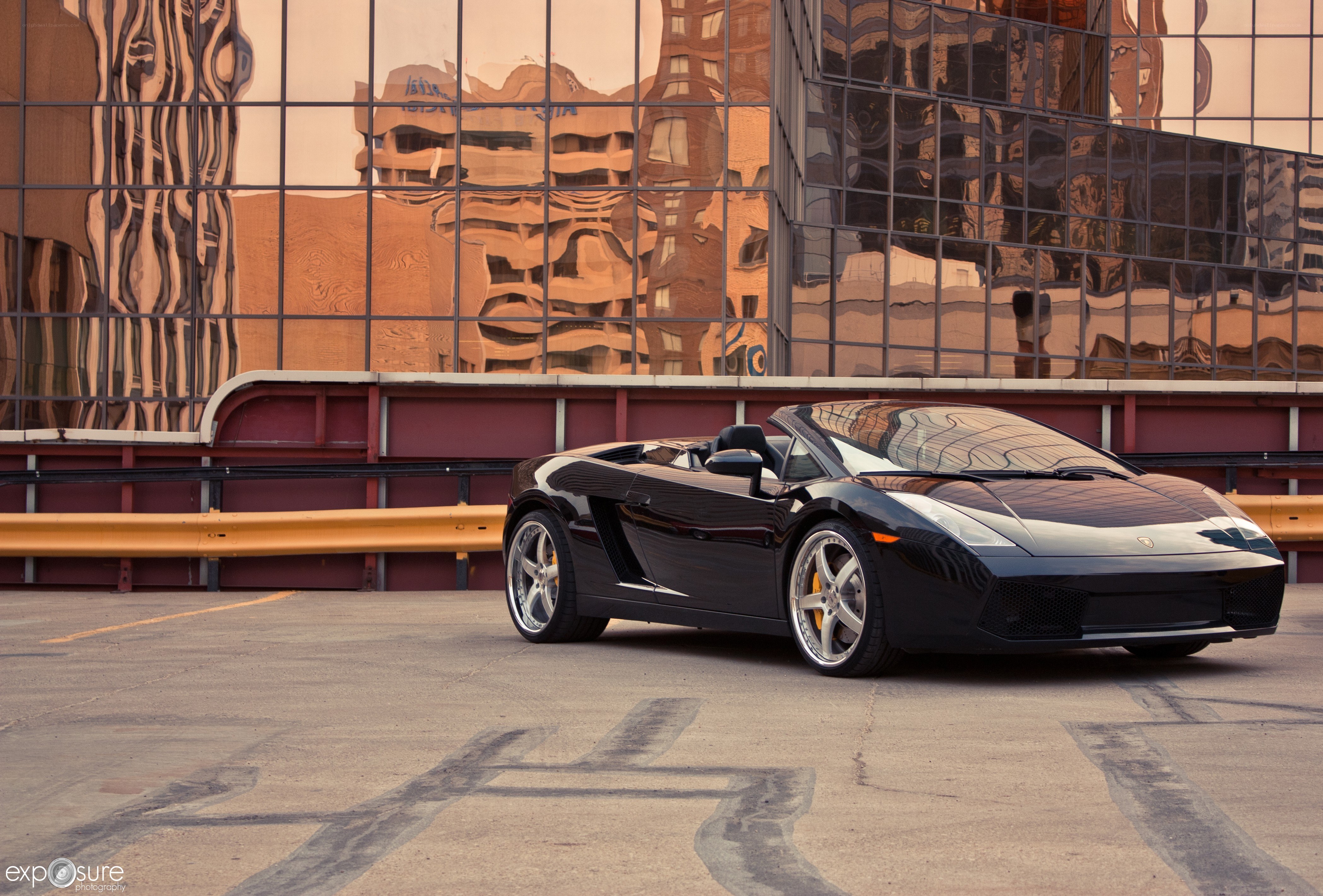 Black Lamborghini in urban setting