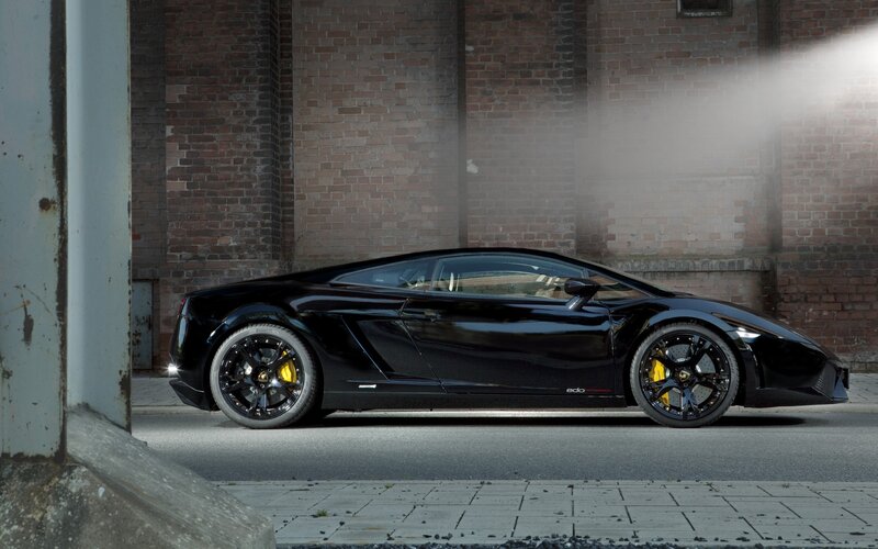 Black Lamborghini in urban setting