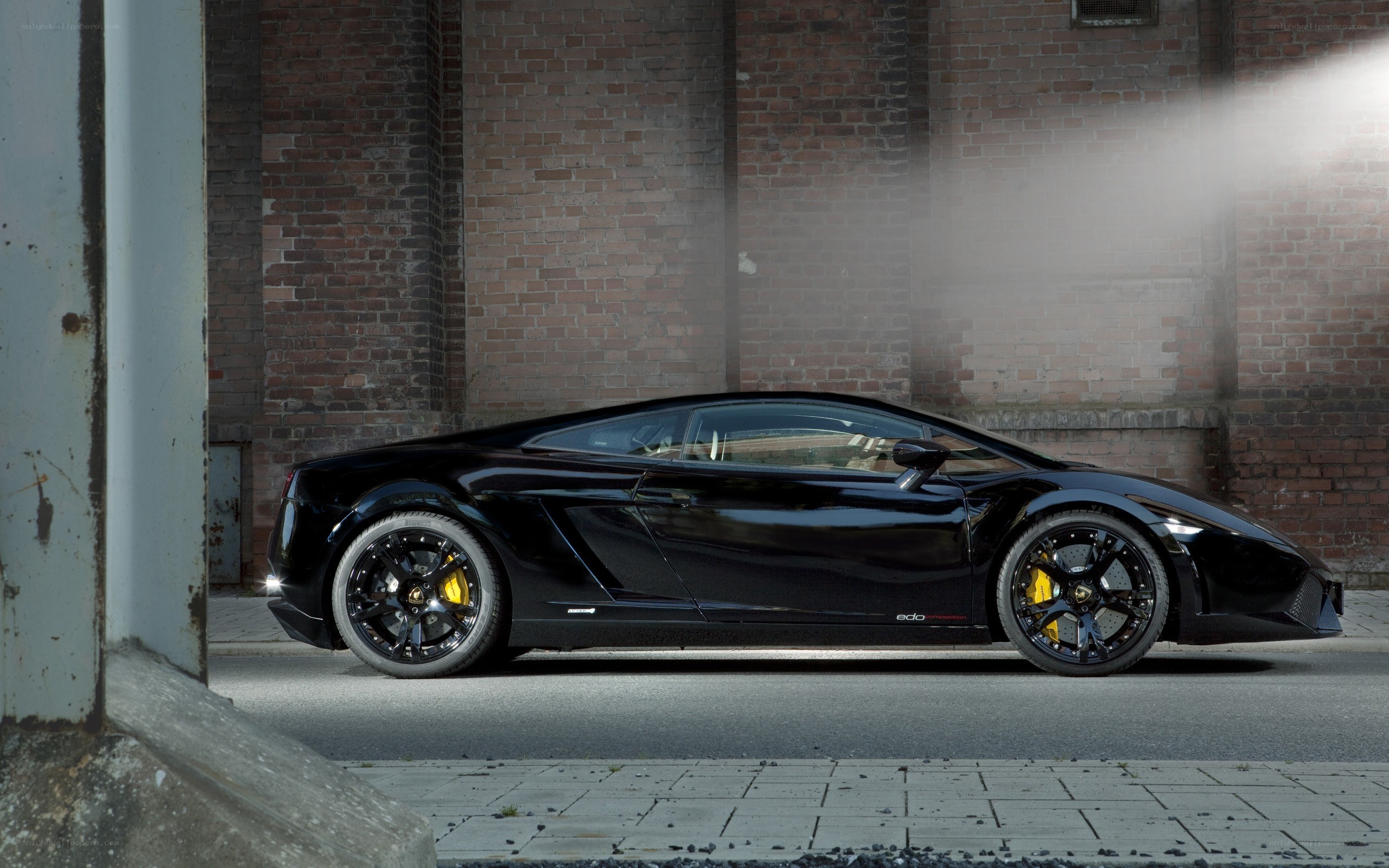 Black Lamborghini in urban setting