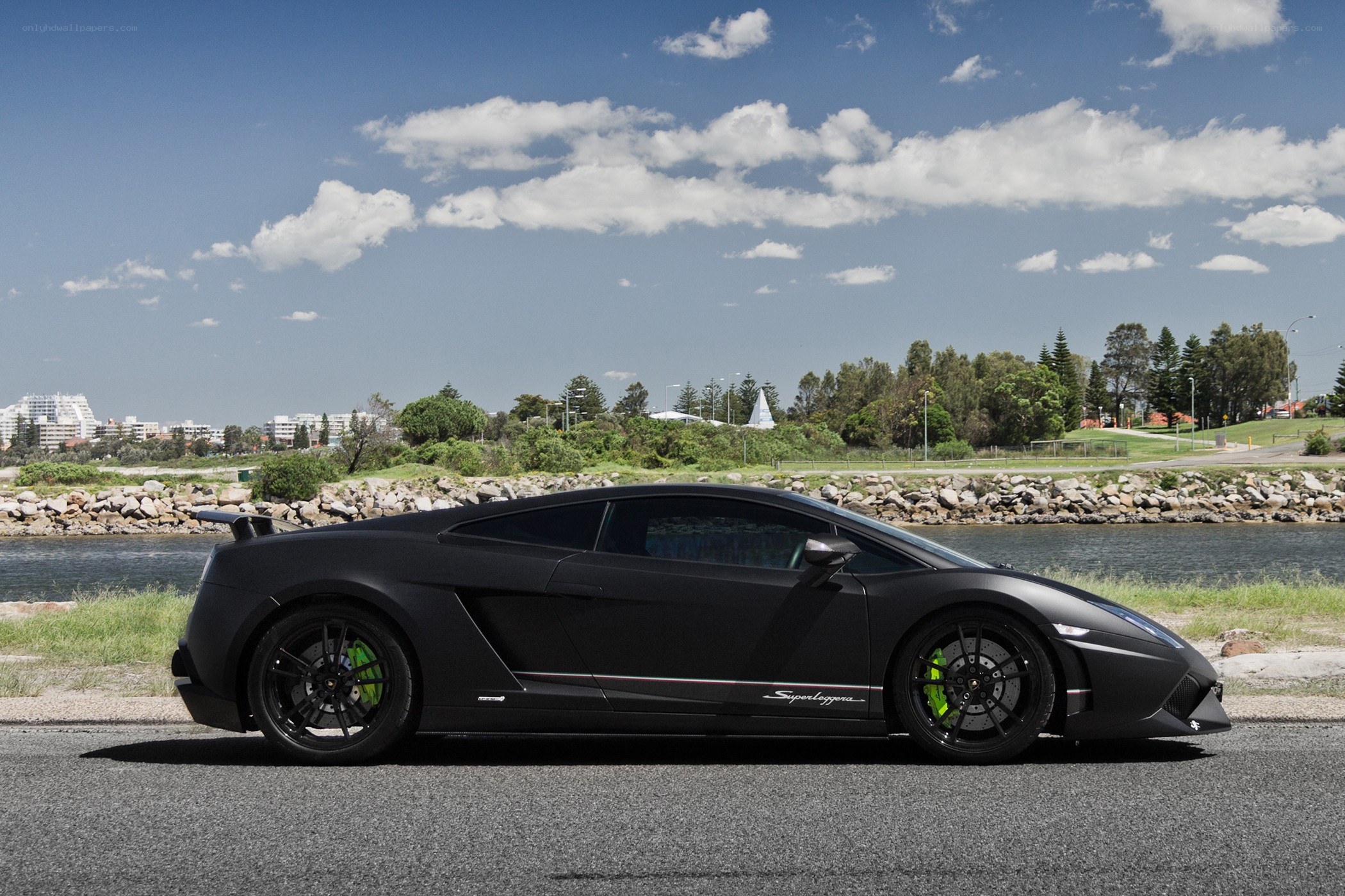 Black Lamborghini on a road