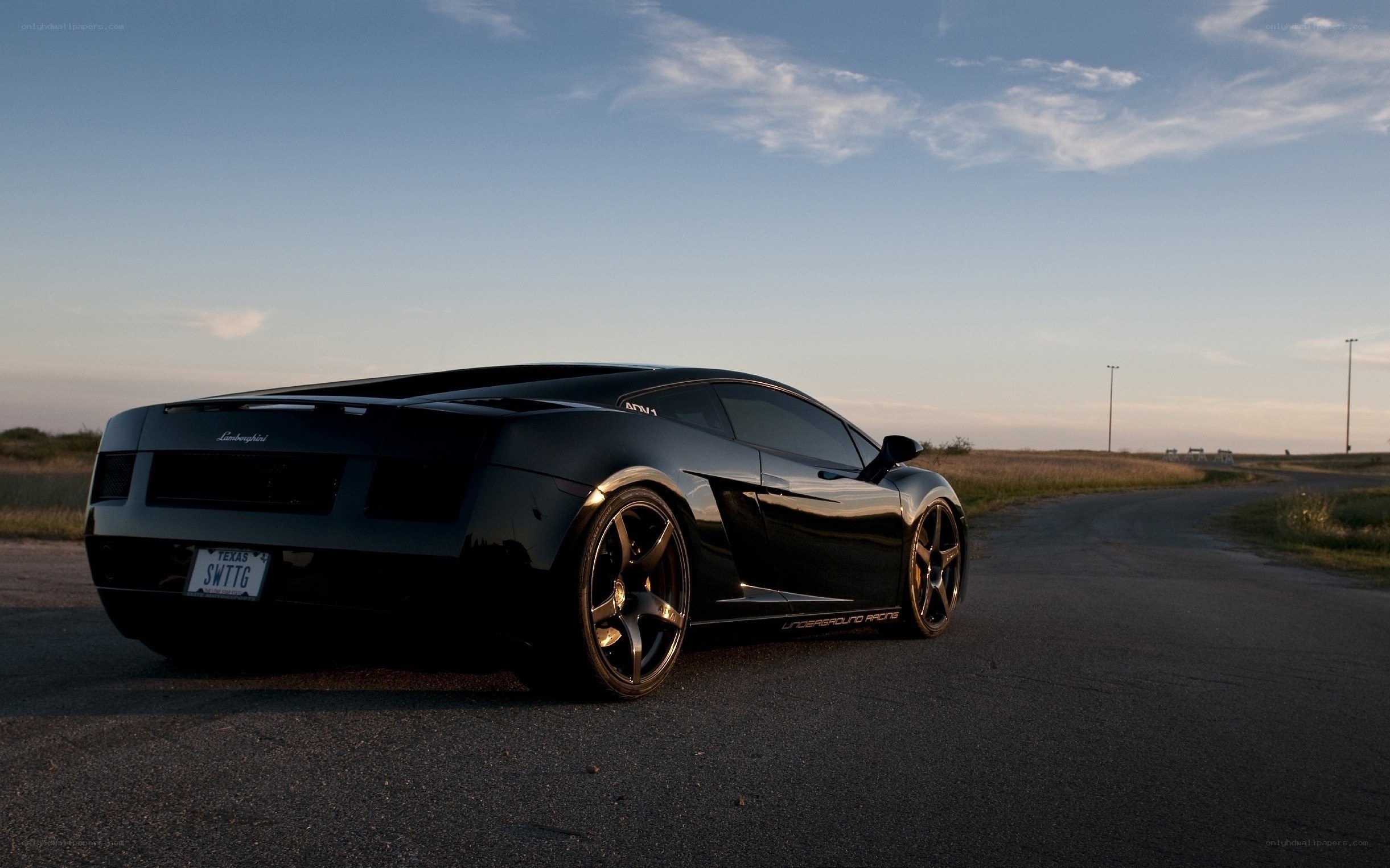 Black Lamborghini on a road
