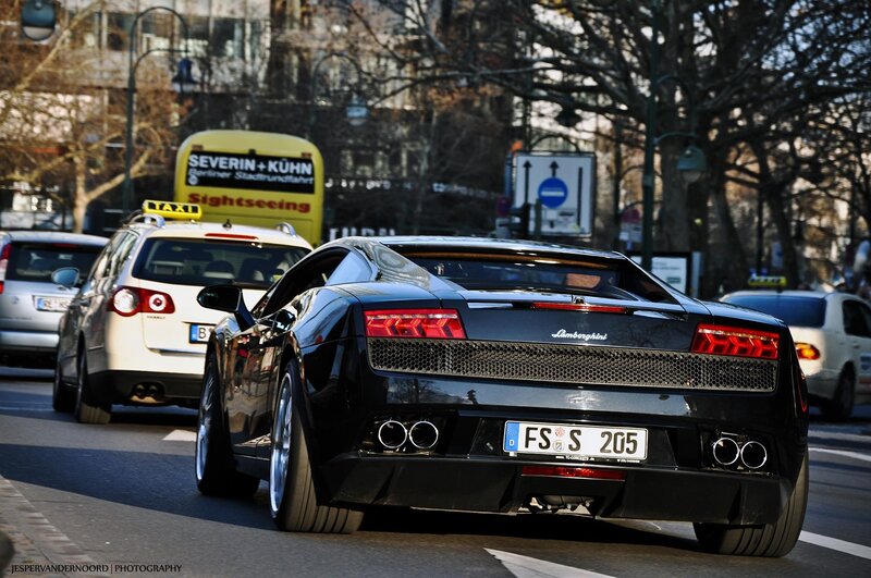 Black Lamborghini on city street