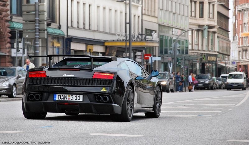 Black Lamborghini on city street