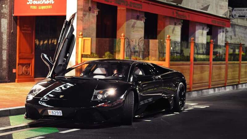 Black Lamborghini on city street