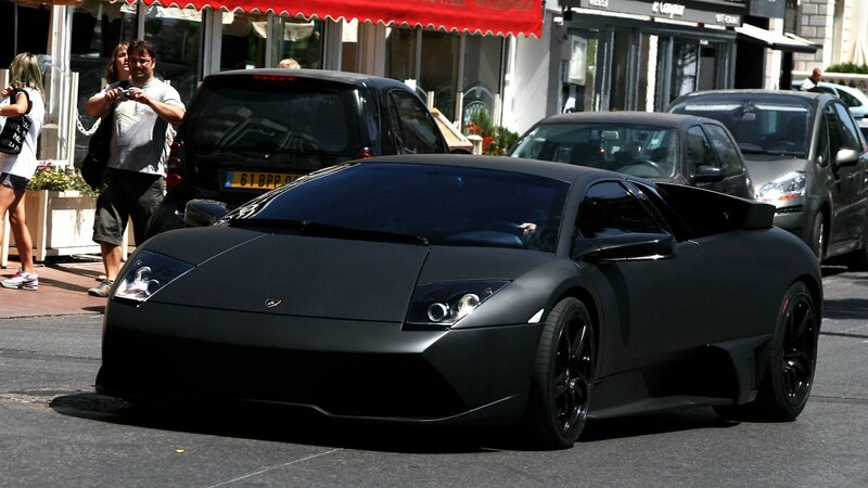 Black Lamborghini on city street