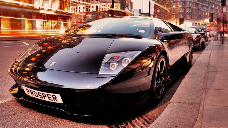 Black Lamborghini on city street