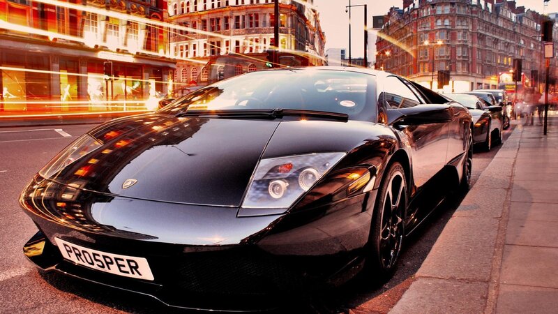 Black Lamborghini on city street