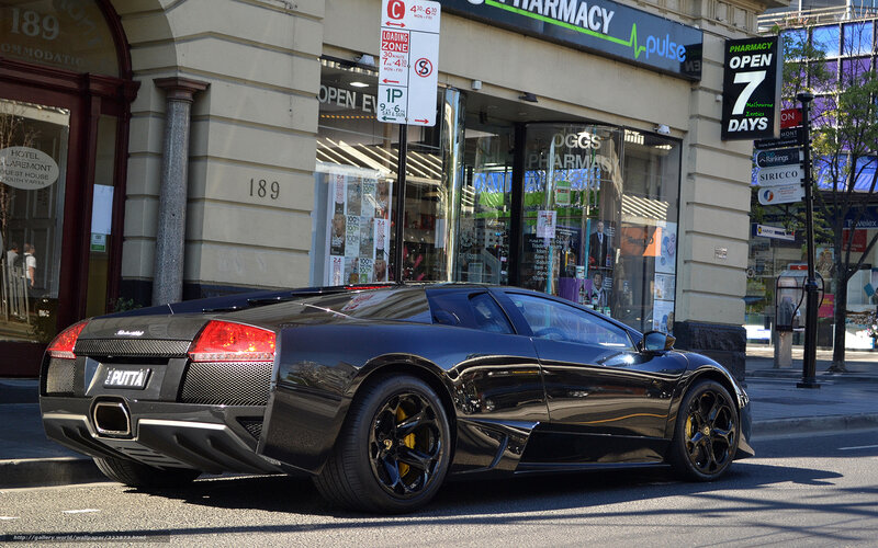 Black Lamborghini on city street