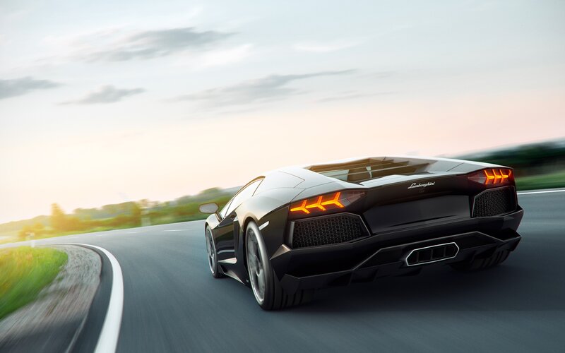 Black Lamborghini on Road — Dynamic, Sunset
