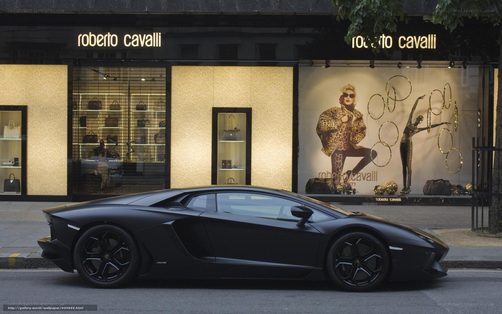 Black Lamborghini outside Roberto Cavalli