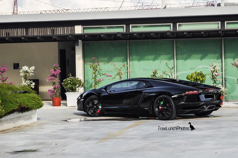 Black Lamborghini parked outside