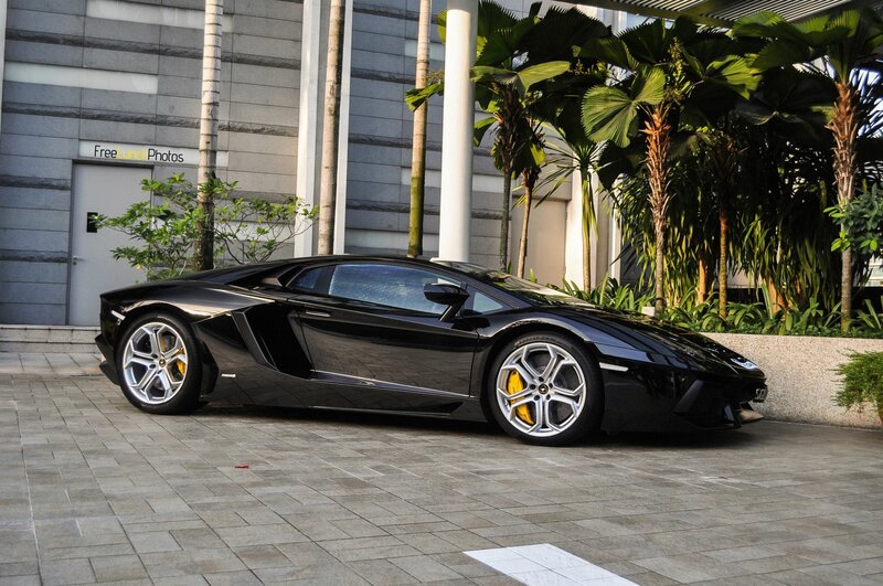 Black Lamborghini parked outside