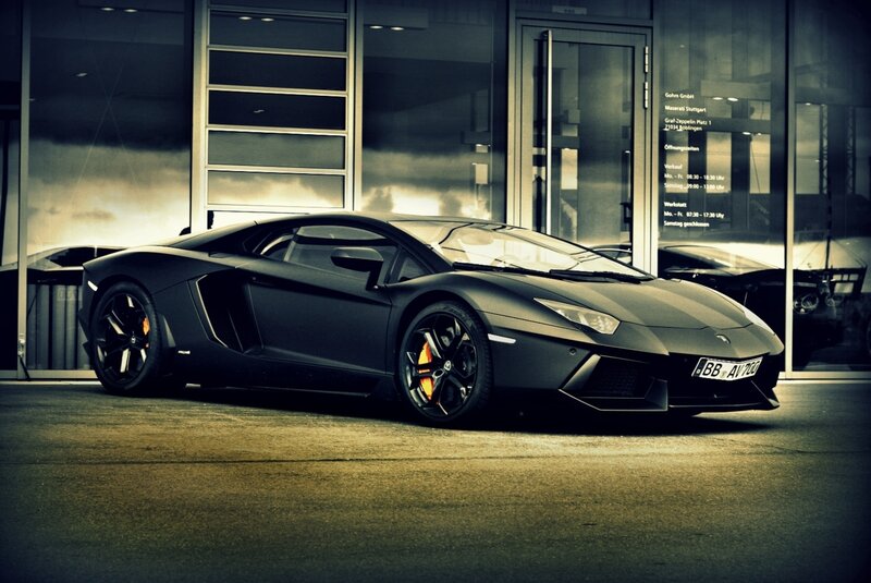 Black Lamborghini Sports Car — Dramatic, Photograph, Building