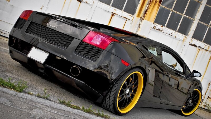 Black Lamborghini Sports Car — Dramatic, Photograph, Building, Wheels