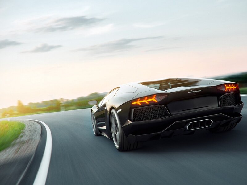 Black Lamborghini Sports Car — Dynamic, Sunset