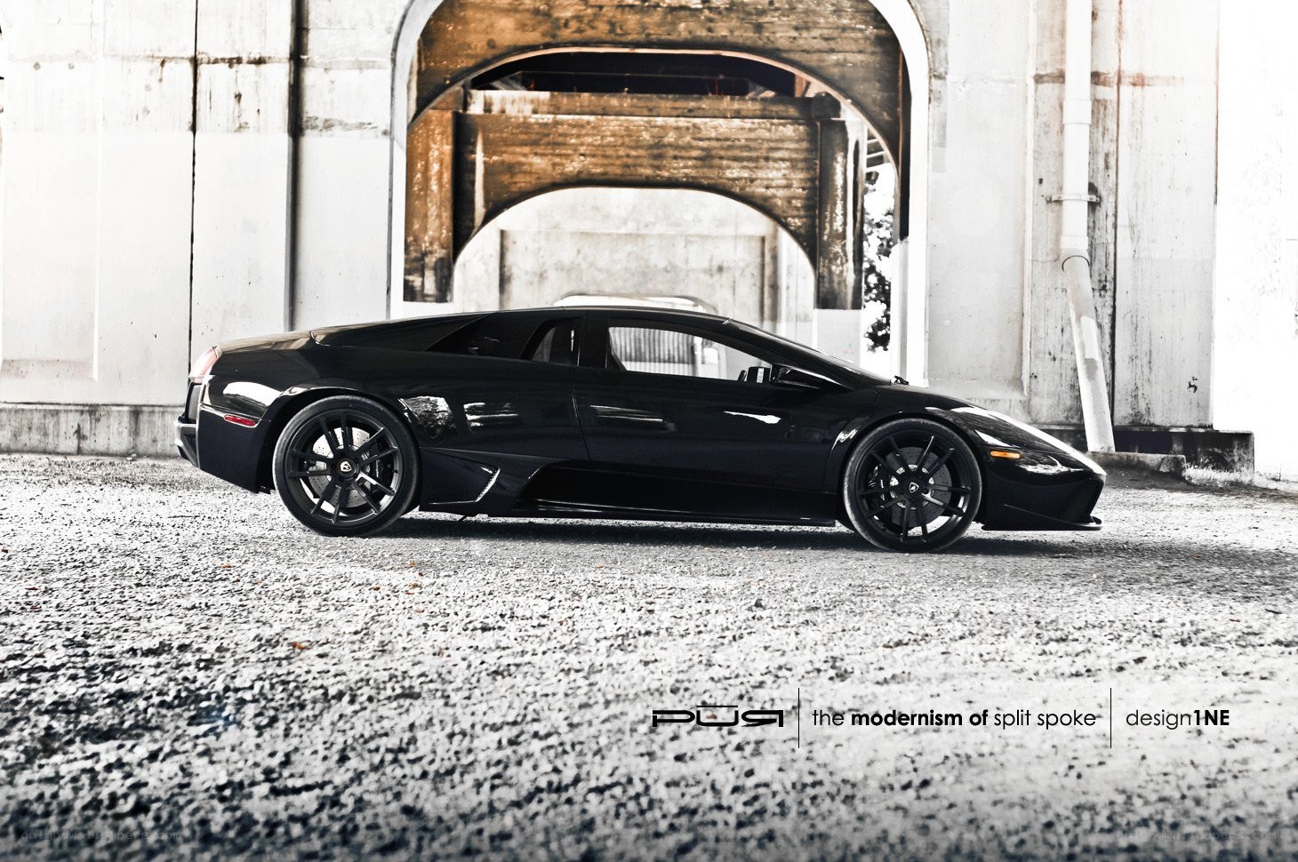black lamborghini under bridge