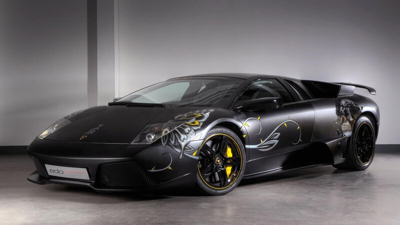 black lamborghini with custom graphics
