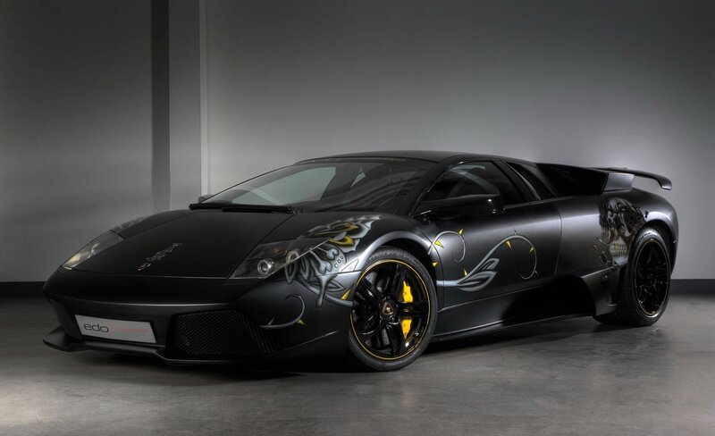 black lamborghini with custom graphics
