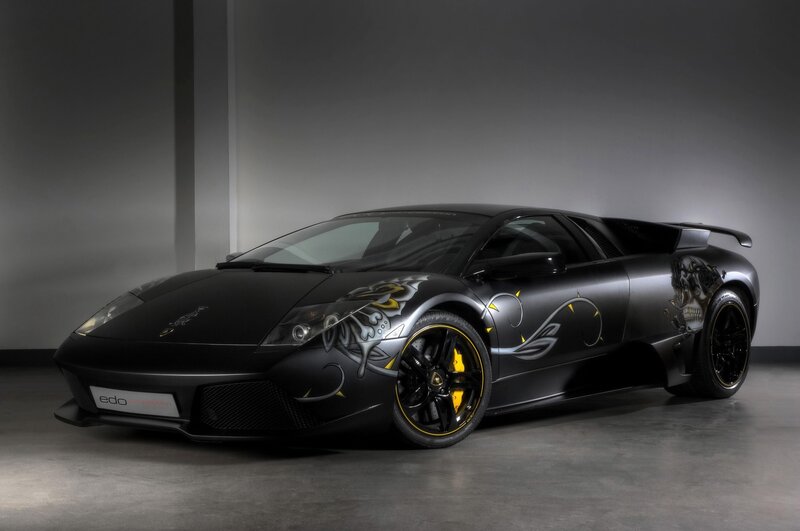 black lamborghini with custom graphics