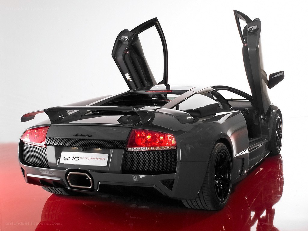 Black Lamborghini with doors open