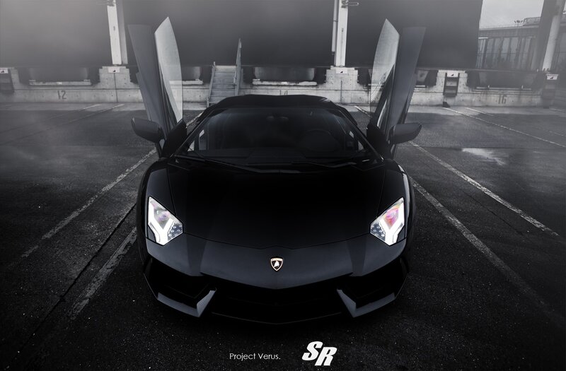Black Lamborghini with doors open