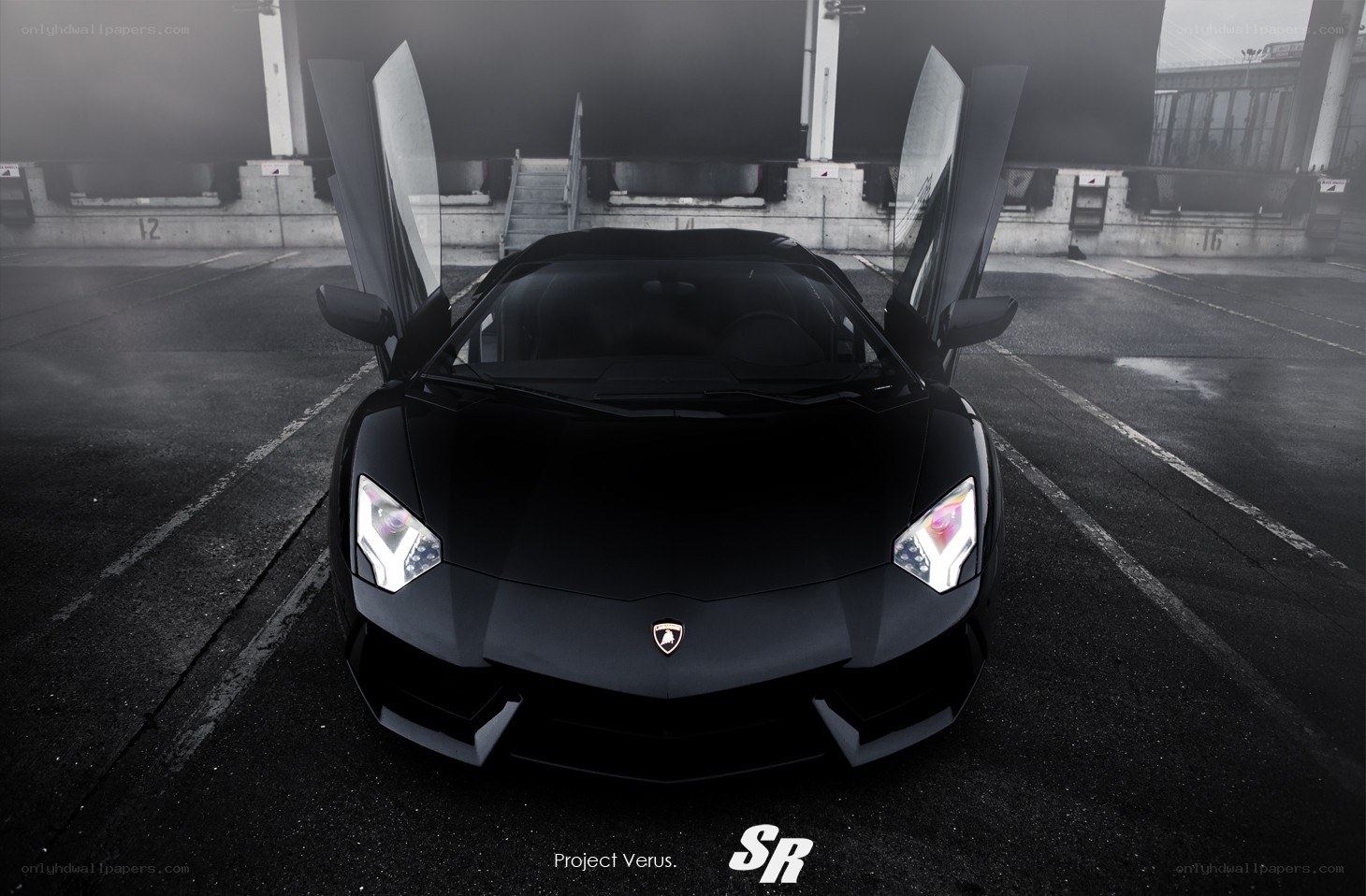 Black Lamborghini with doors open