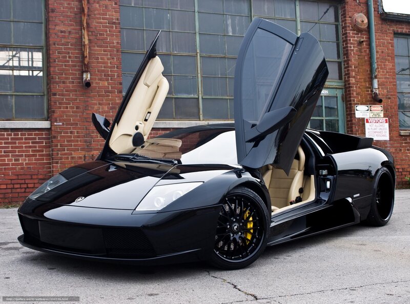 Black Lamborghini with doors open
