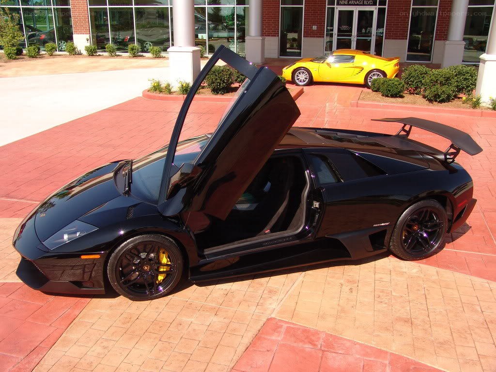 Black Lamborghini with open door