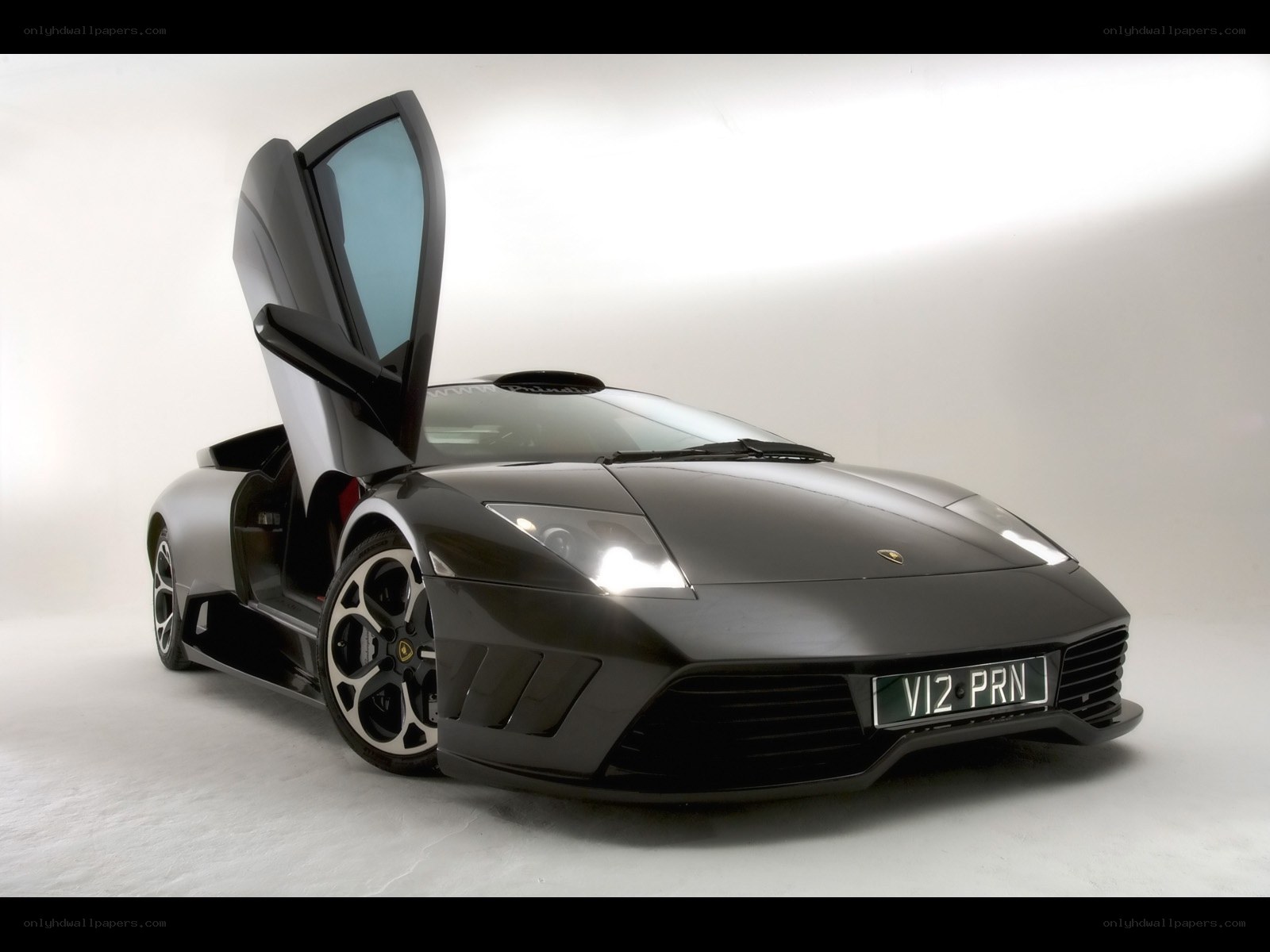 Black Lamborghini with open door