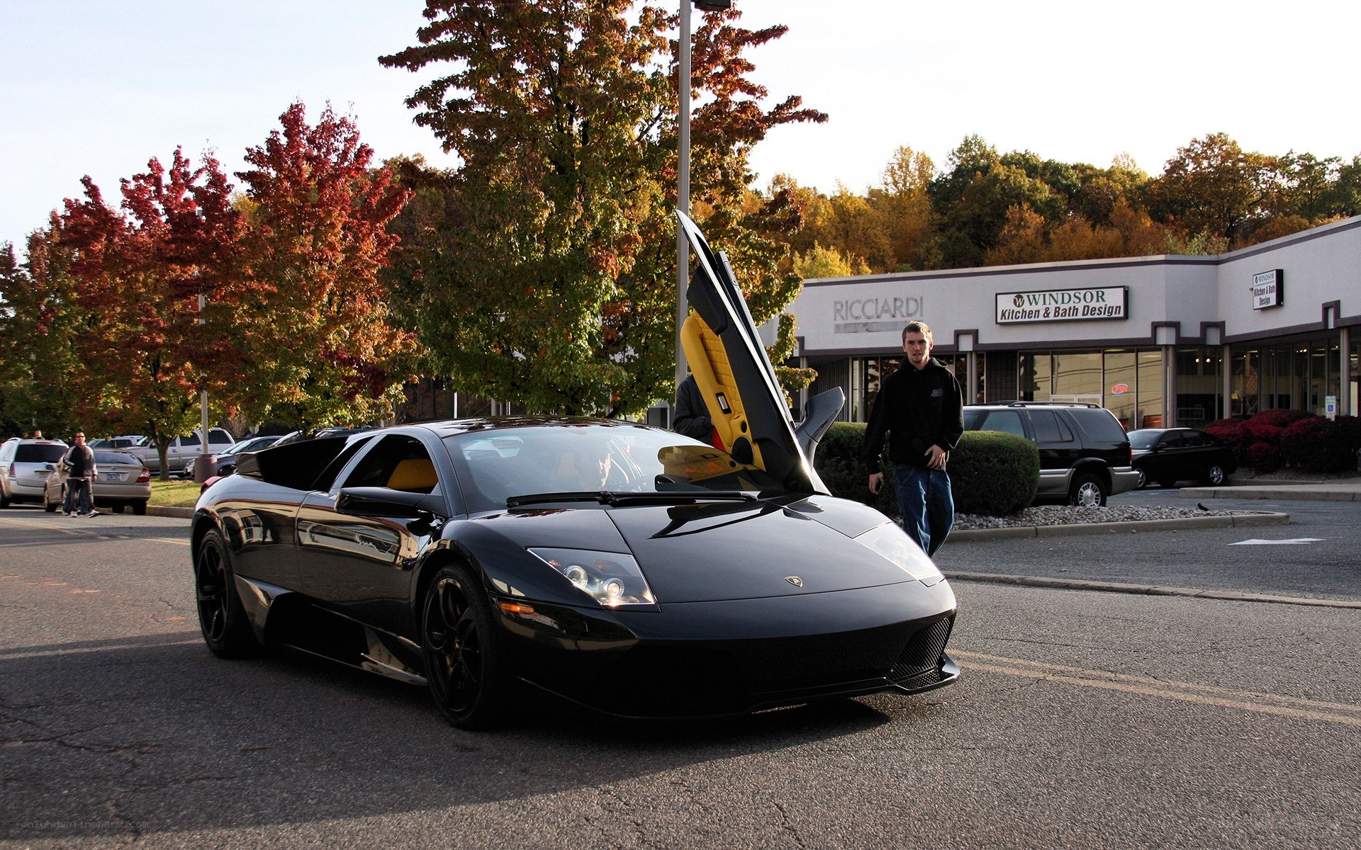 Black Lamborghini with open door