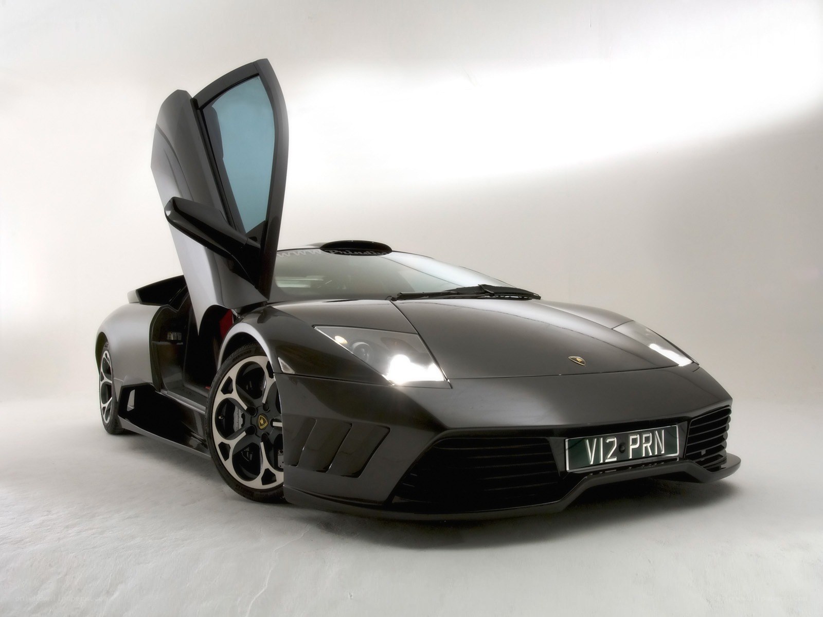 Black Lamborghini with open door