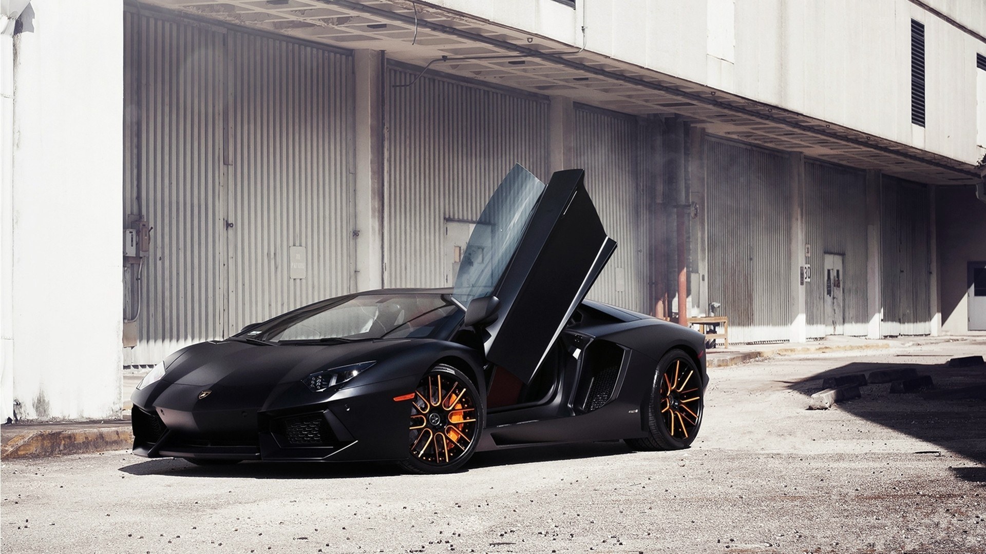 Black Lamborghini with open doors