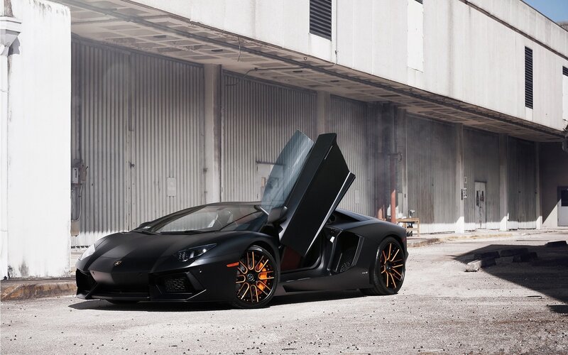 Black Lamborghini with open doors