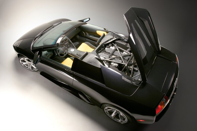 Black Lamborghini with open engine