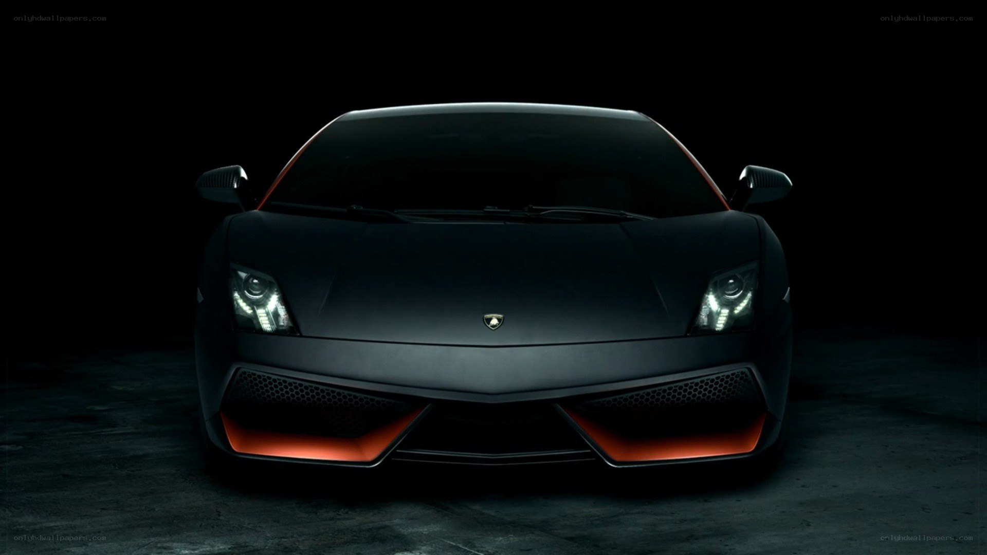 black lamborghini with orange accents