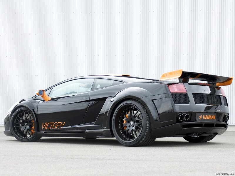 Black Lamborghini with orange accents