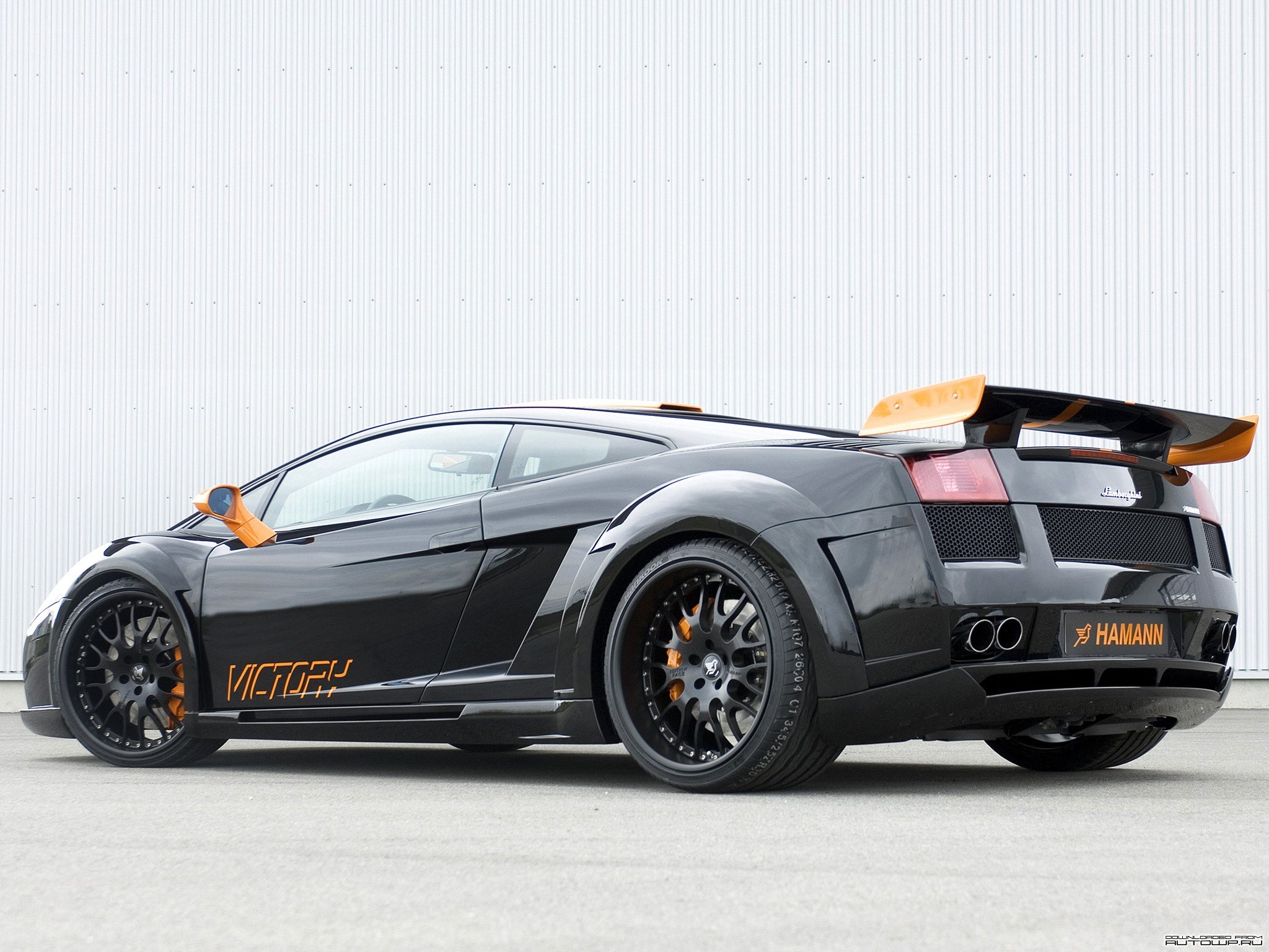 Black Lamborghini with orange accents