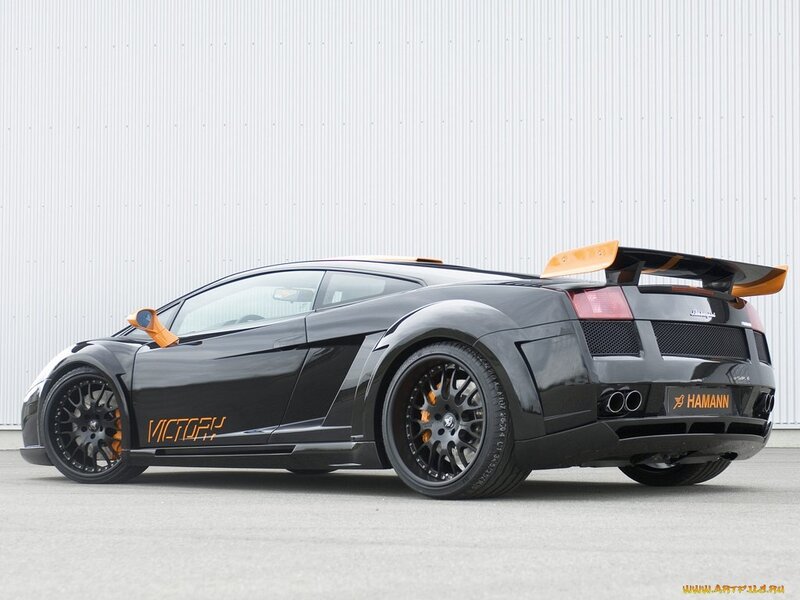 Black Lamborghini with orange accents