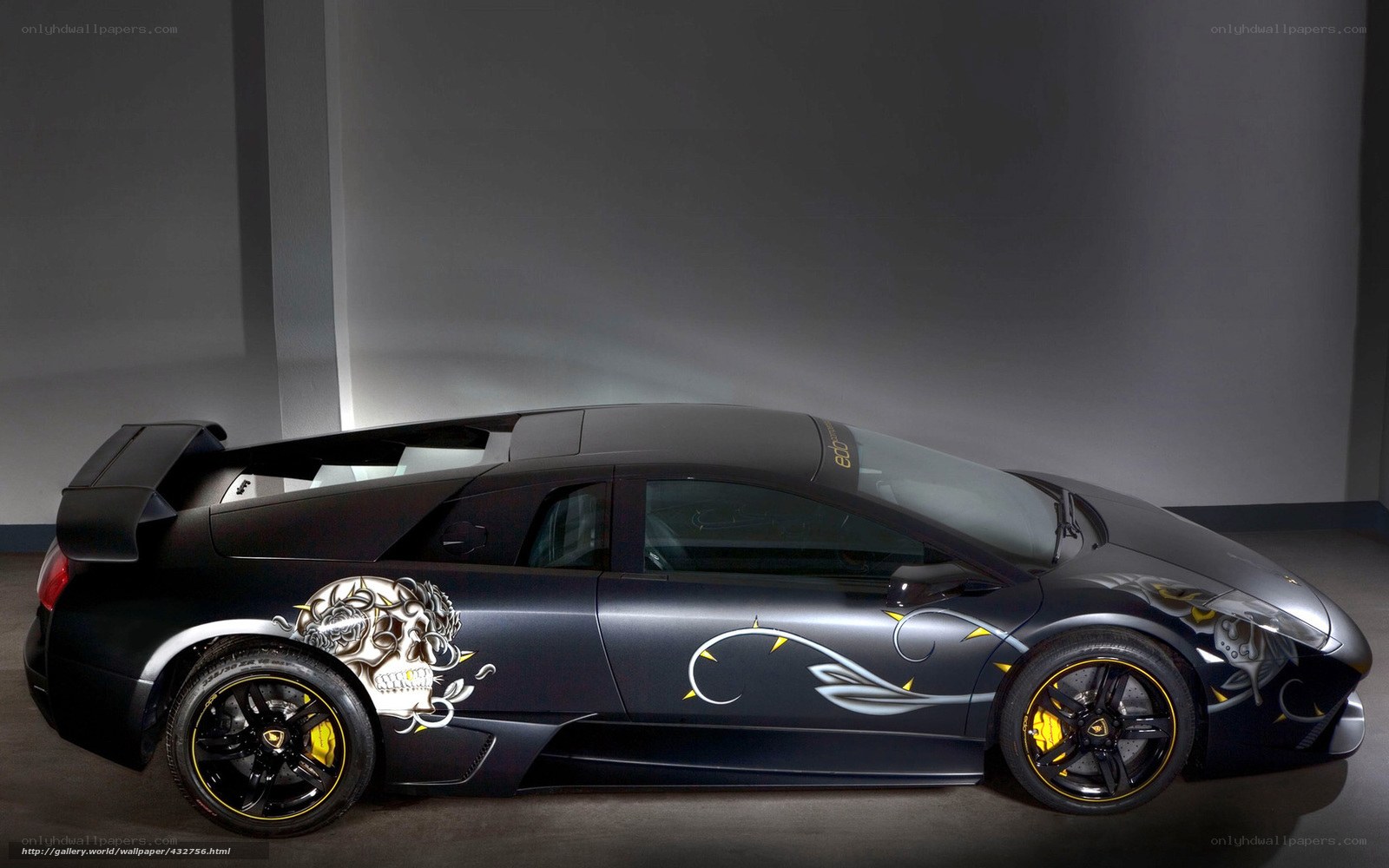 black lamborghini with skull design