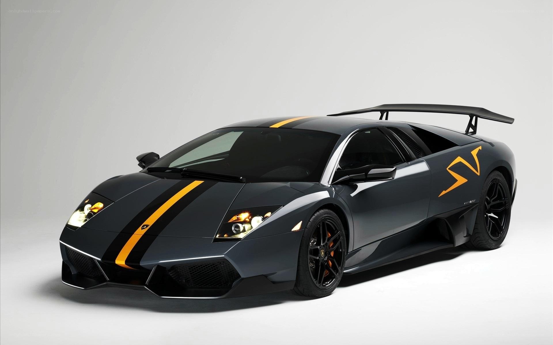 Black Lamborghini with yellow stripes