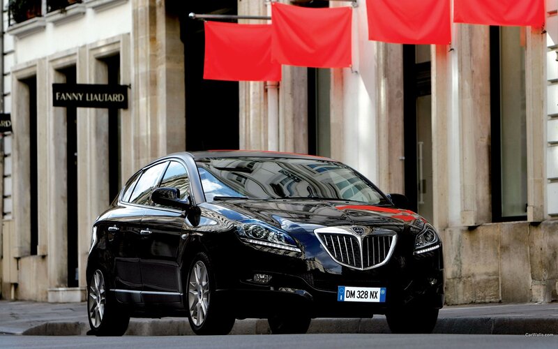 Black Lancia car on city street