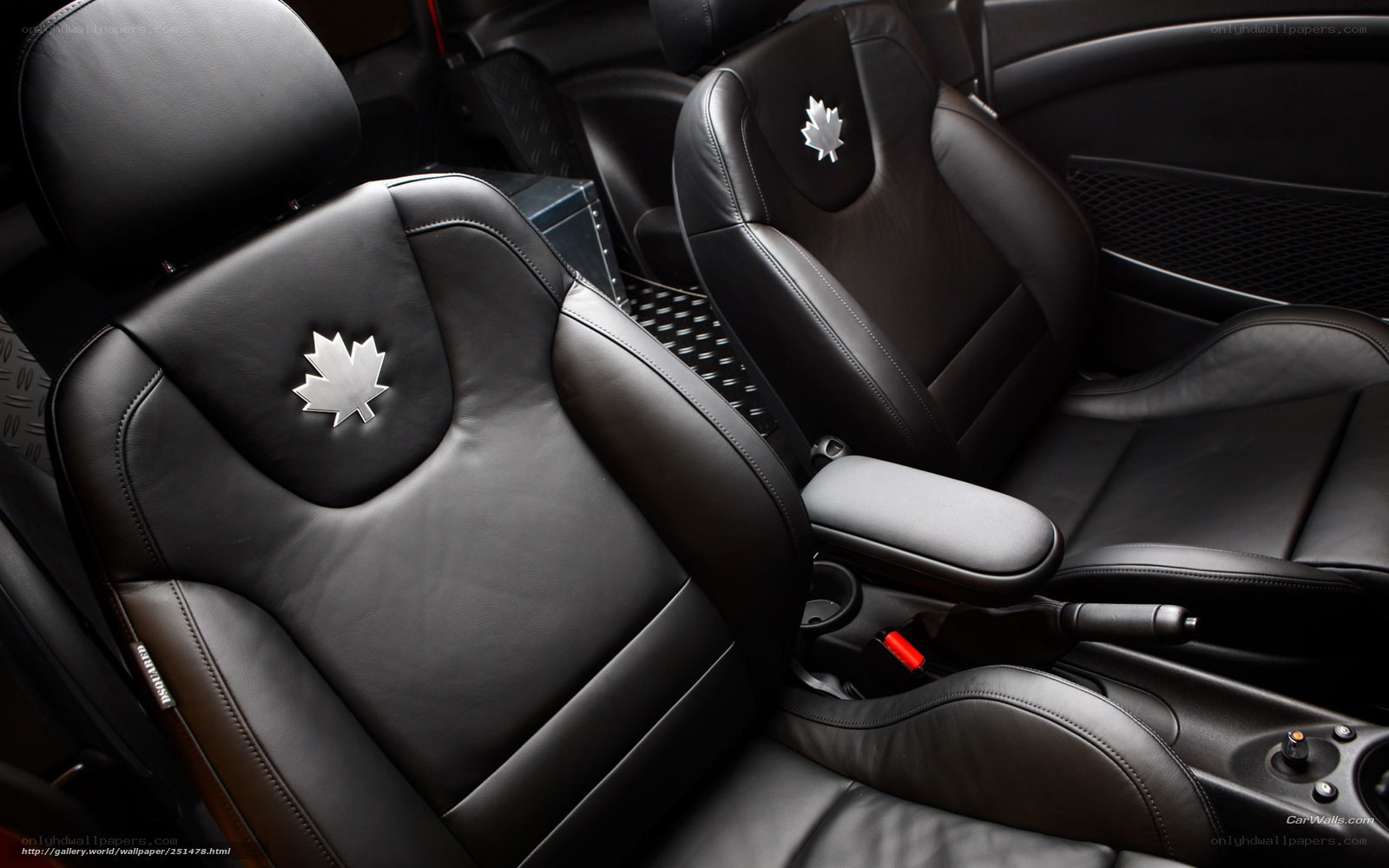 Black leather car seats with maple leaf