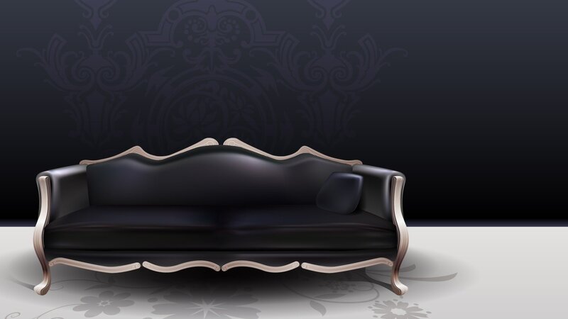 black leather sofa with ornate frame