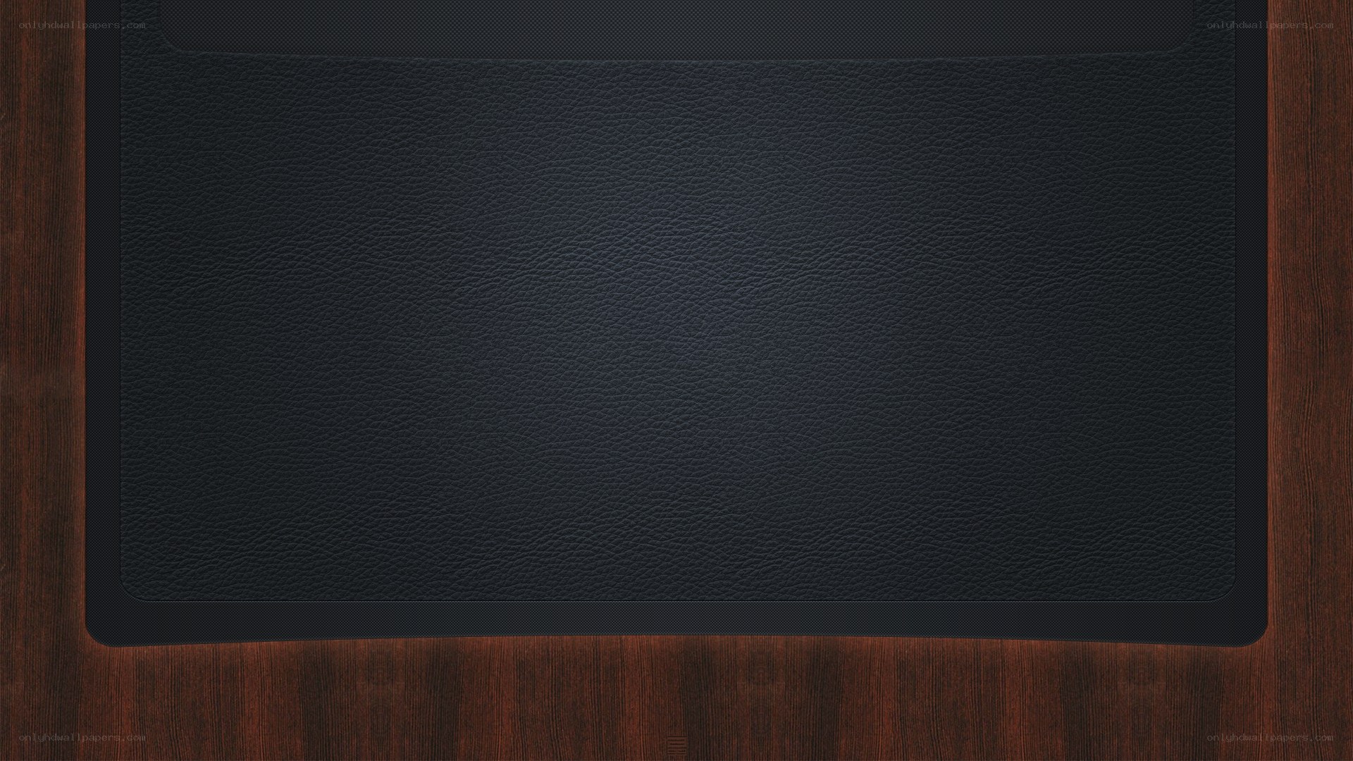 black leather surface on wood