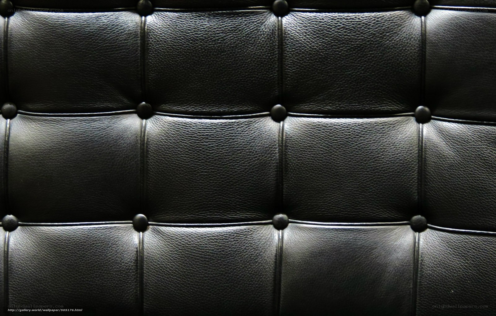 black leather tufted upholstery
